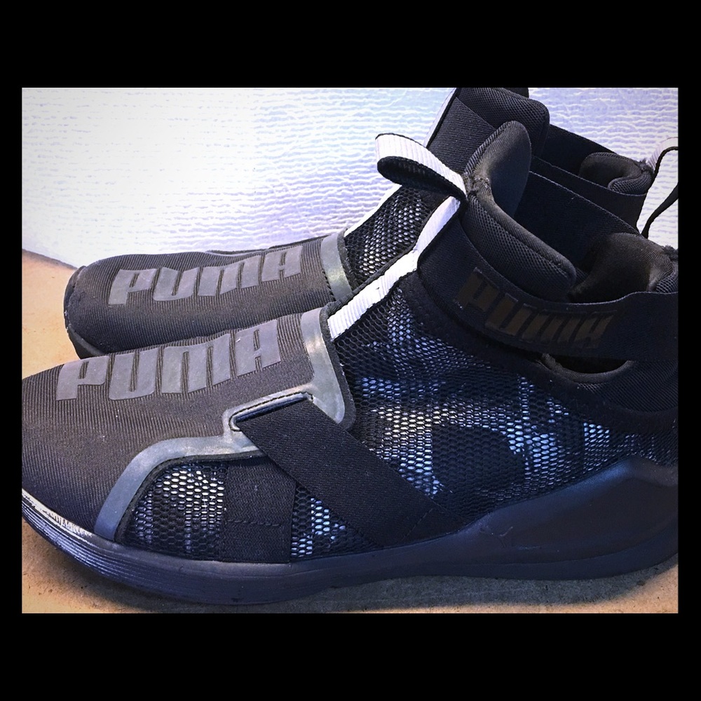 Women’s black Puma hightop